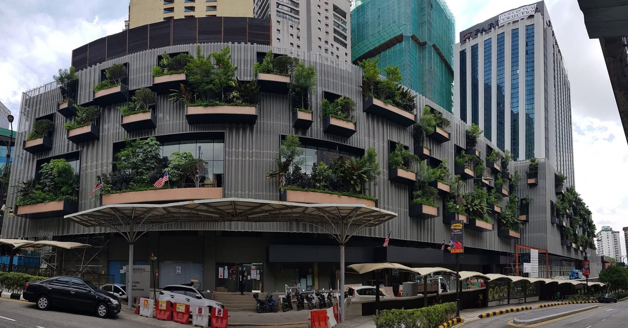 Parkroyal Collection Kuala Lumpur: the completed podium with its planted façade and the hotel tower behind