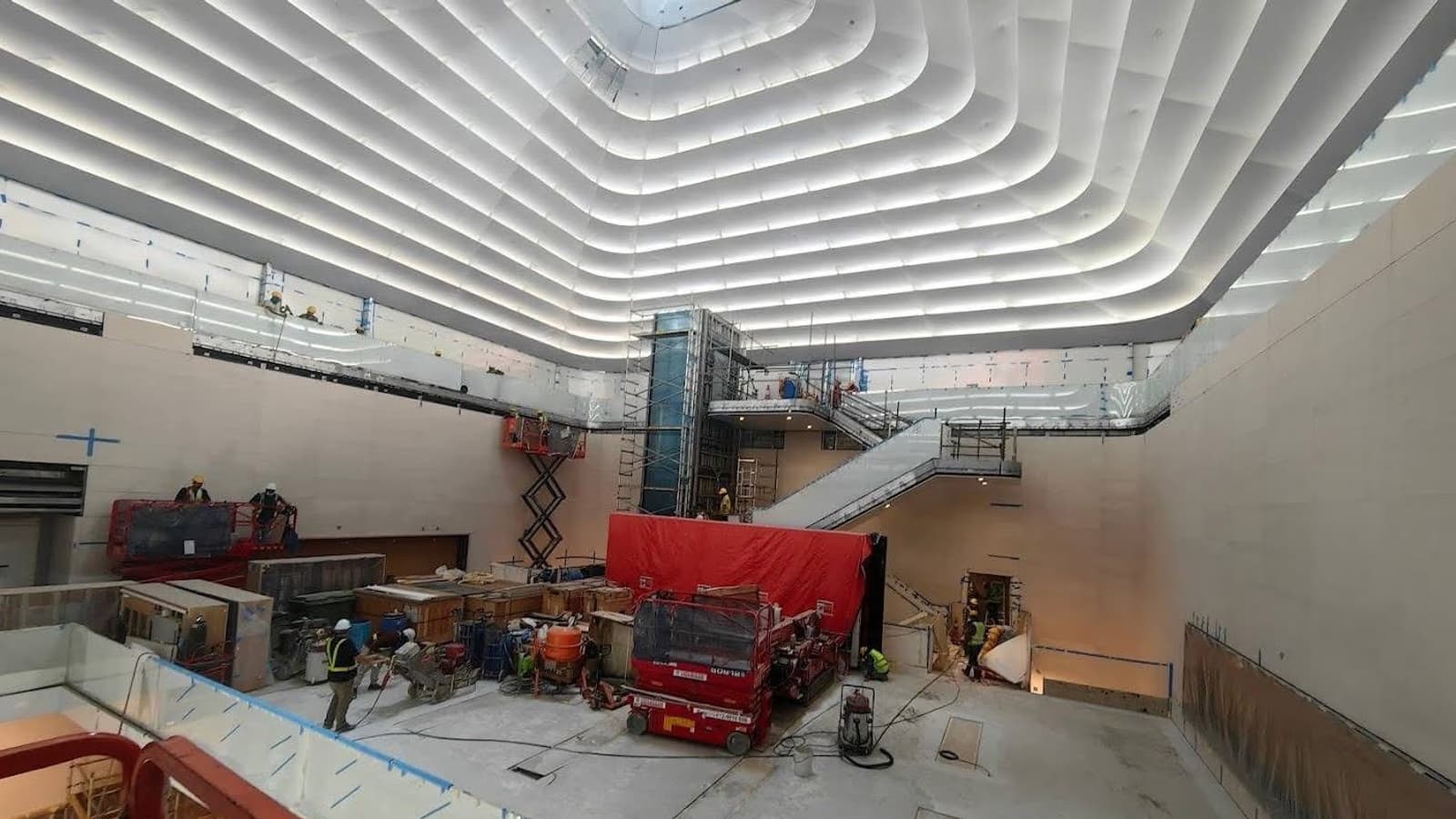 Upper atrium during construction with plant and scaffolding
