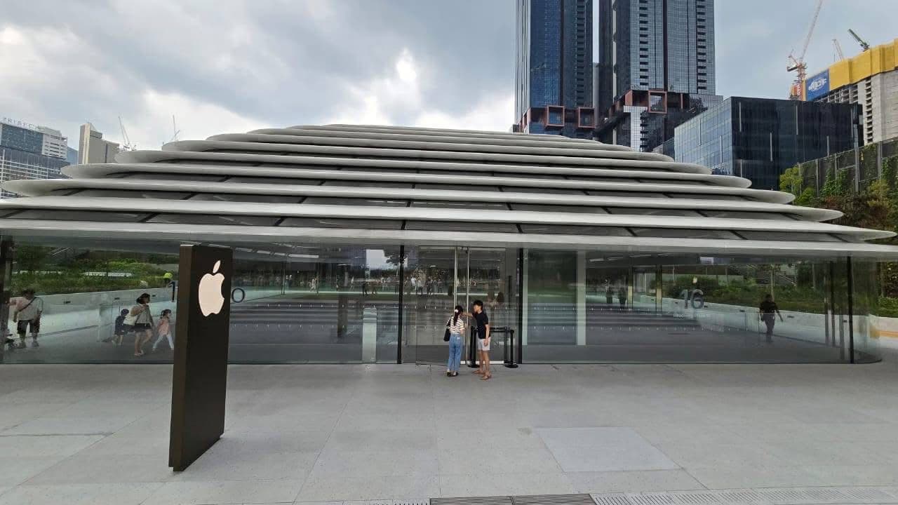 Apple The Exchange TRX pavilion with its layered canopy roof and park plaza